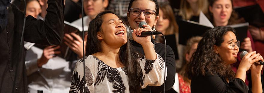 Woman singing during worship service