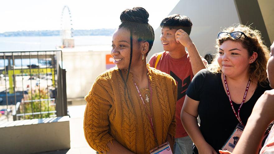 Students smile in the sunlight during the Early Connections downtown Seattle excursion